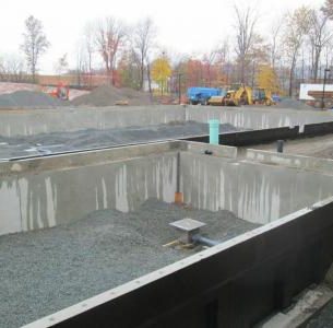 Precast concrete pool walls.